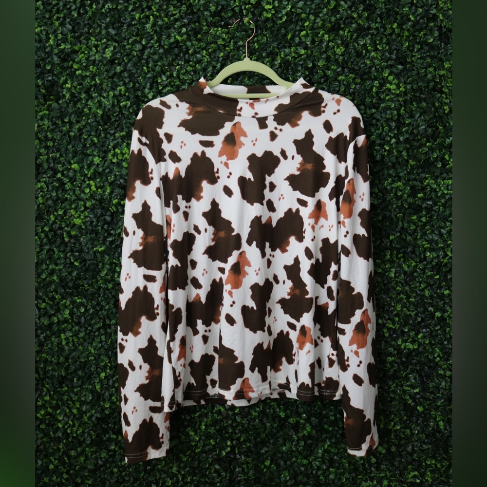 Cow Print Long Sleeve
Brand: Shein
Condition: New
Size: 2XL